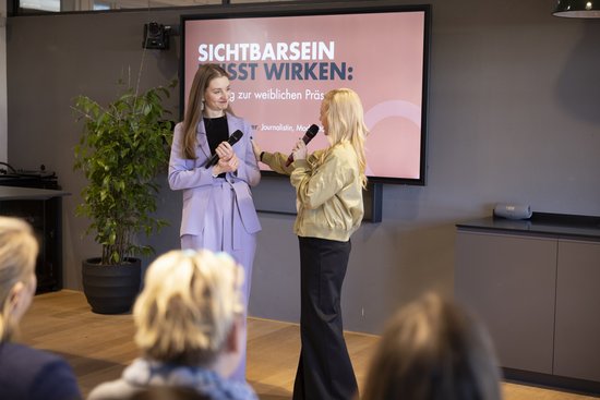 Adult,  Child,  Clothing,  Coat,  Electrical Device,  Female,  Girl,  Microphone,  Person,  Woman