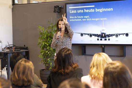 Adult,  Airplane,  Child,  Crowd,  Female,  Girl,  Microphone,  People,  Person,  Woman