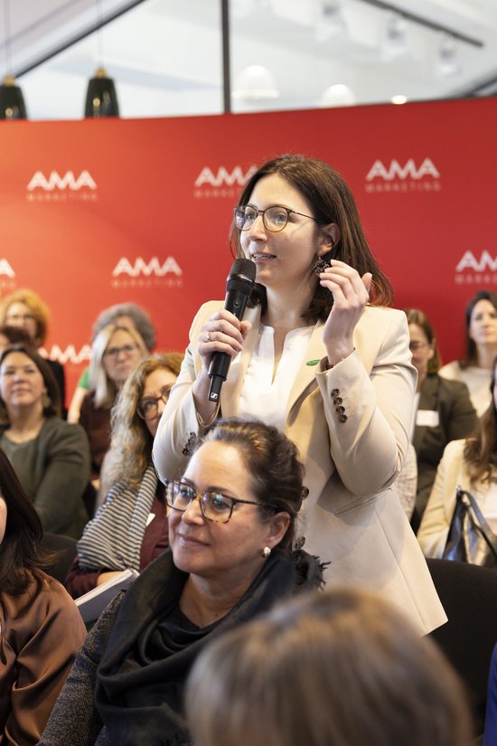 Accessories,  Adult,  Crowd,  Electrical Device,  Female,  Glasses,  Microphone,  People,  Person,  Woman