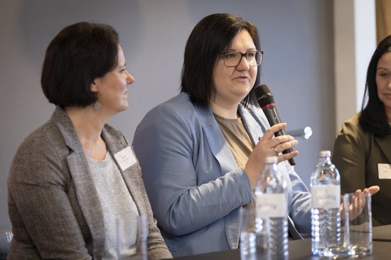 Accessories,  Adult,  Crowd,  Electrical Device,  Female,  Glasses,  Microphone,  People,  Person,  Woman