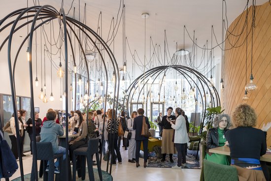 Adult,  Cafeteria,  Female,  Furniture,  Handbag,  Indoors,  Lounge,  Person,  Restaurant,  Woman